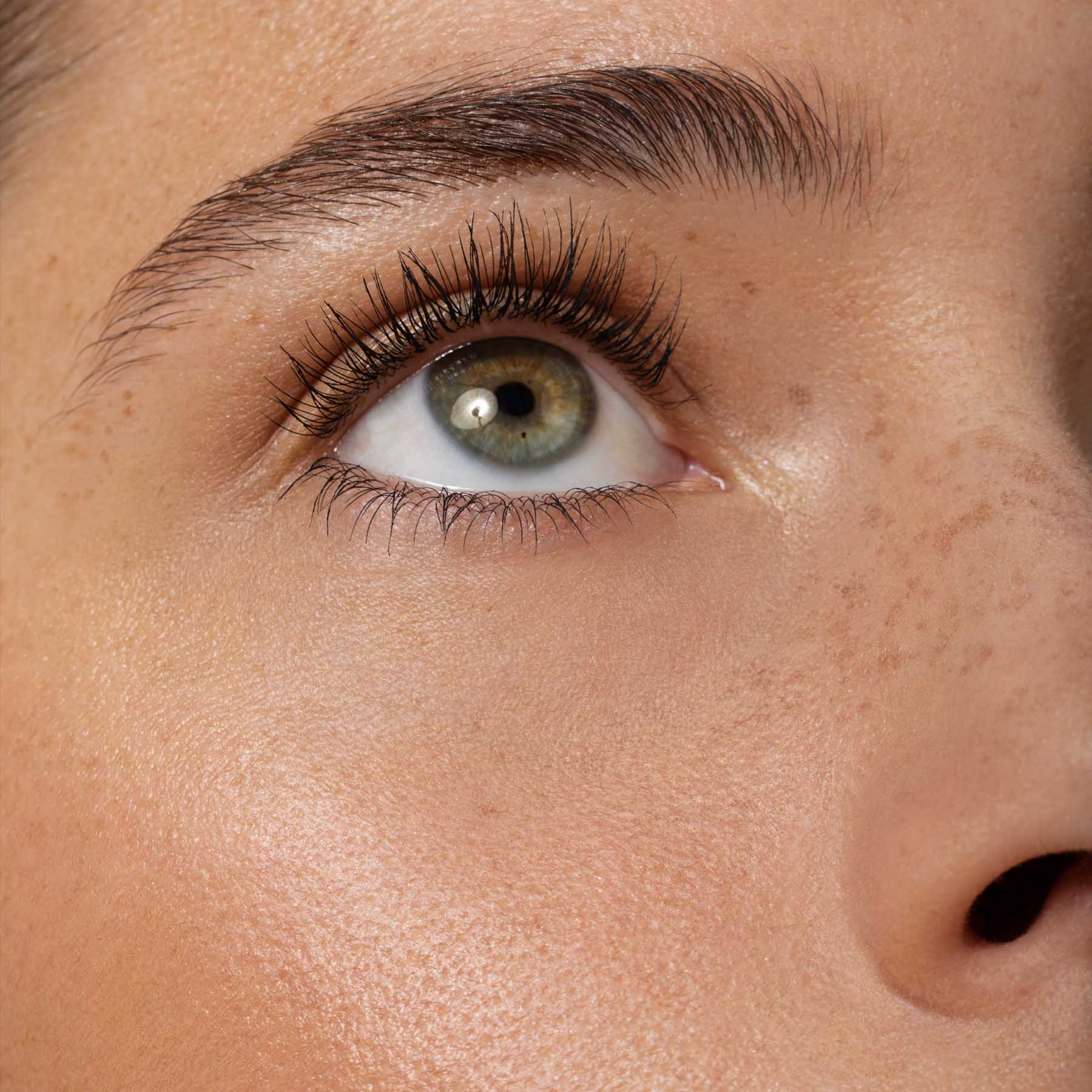 model wears Aleph Lift/Lengthen Mascara